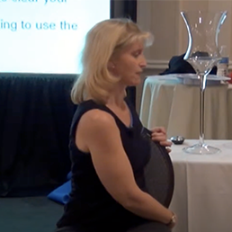 Holly at the Women’s Toolbox Conference in 2011, demonstrating exercises you can do at work