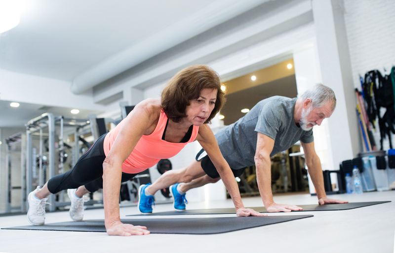 Older Couple doing pushups together