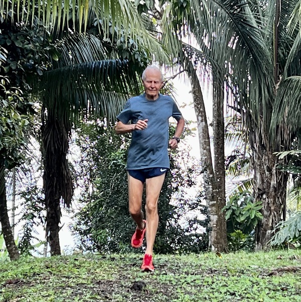 Image of Elmo Shropshire, an elder man, running on a path